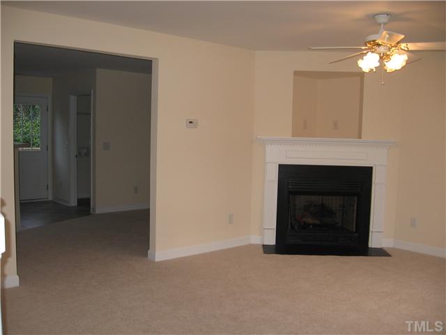 5633 Tealbrook Drive Raleigh, NC 27610 - Photo 2 of 3 Living Room to Dining, utility and back deck