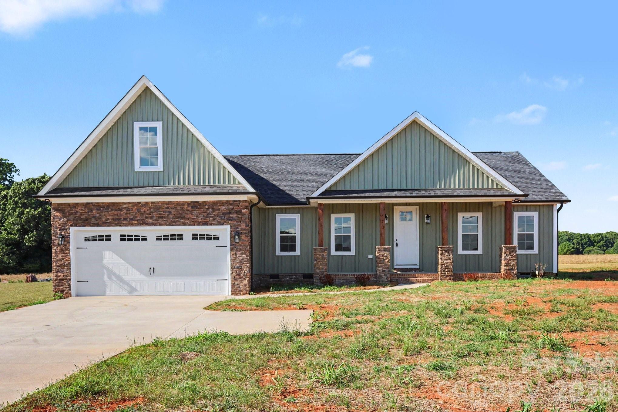 190 Goodnight Road Salisbury, NC 28147 - Photo 2 of 35 a front view of a house with a garden