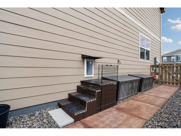 a view of a terrace with wooden walls