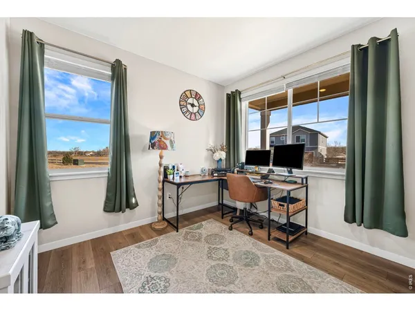 a workspace with furniture window and outside view