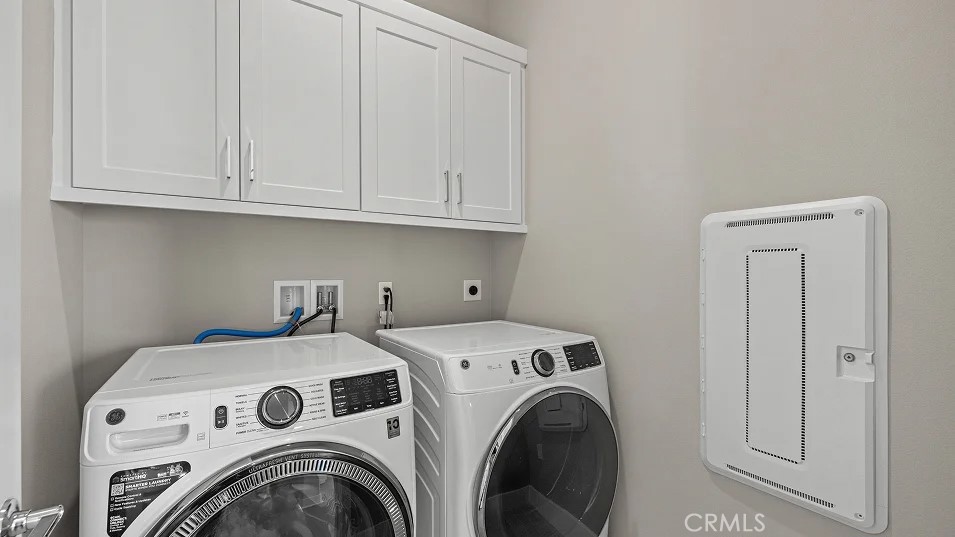 15 Merit Irvine, CA 92618 - Photo 21 of 33 a utility room with dryer and washer