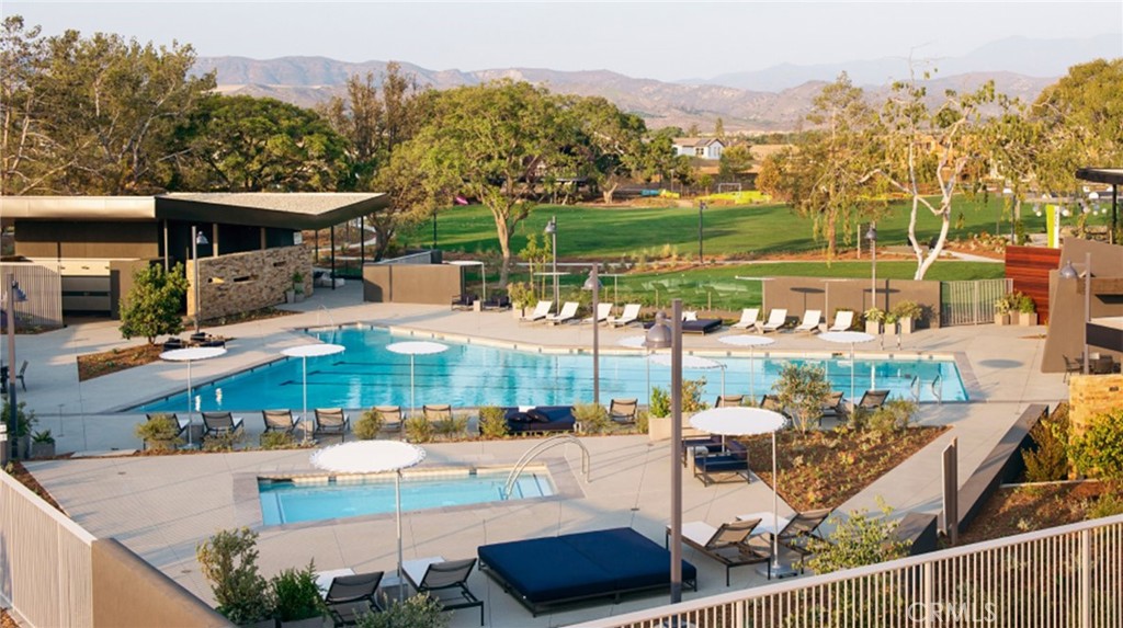 15 Merit Irvine, CA 92618 - Photo 25 of 33 a view of a house with a swimming pool