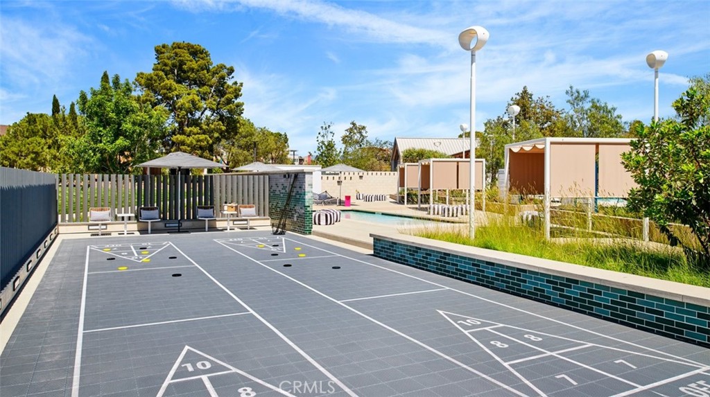 15 Merit Irvine, CA 92618 - Photo 29 of 33 a view of a patio with a table chairs and a small yard