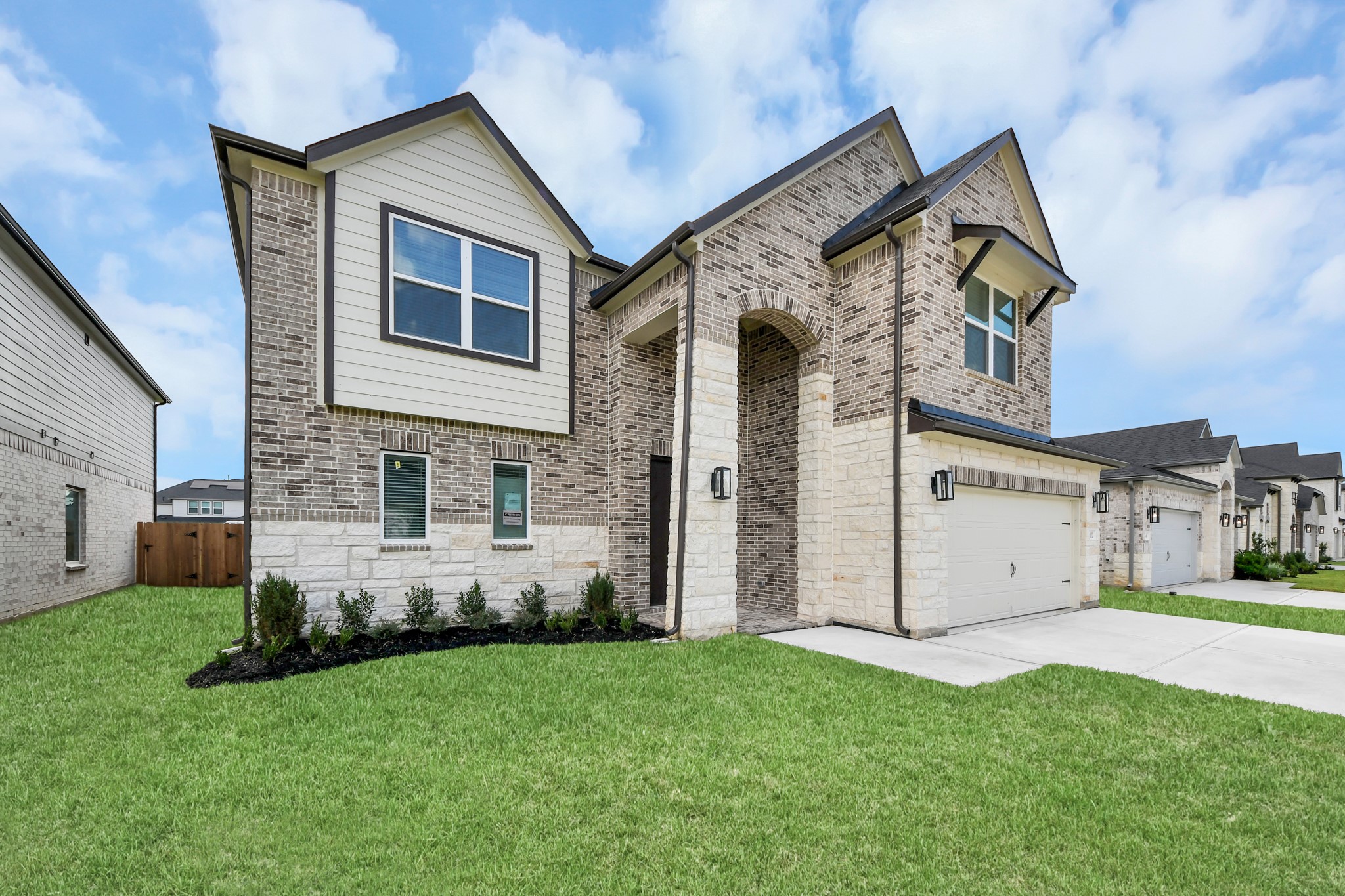3102 Native Spg Drive Spring, TX 77373 - Photo 2 of 47 The residence features a practical 2-car garage complemented by a generous driveway, ensuring abundant space for parking needs.