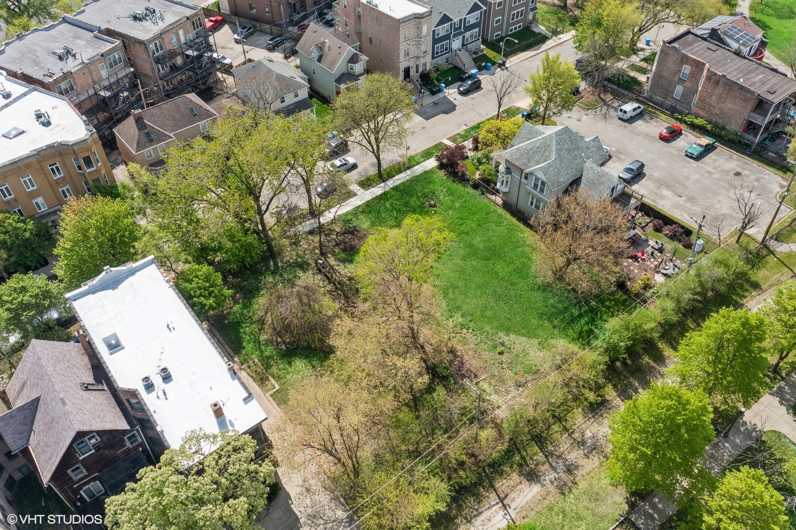 6422 South Minerva Avenue Chicago, IL 60637 - Photo 2 of 3 an aerial view of a house with a yard