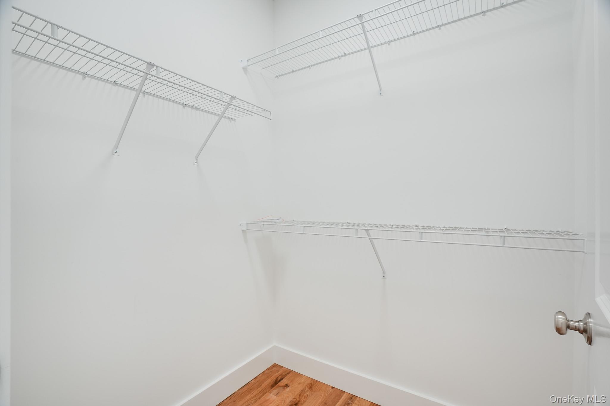 6 Roundhill Road Hopewell Junction, NY 12533 - Photo 12 of 23 a view of a room with racks on the wall