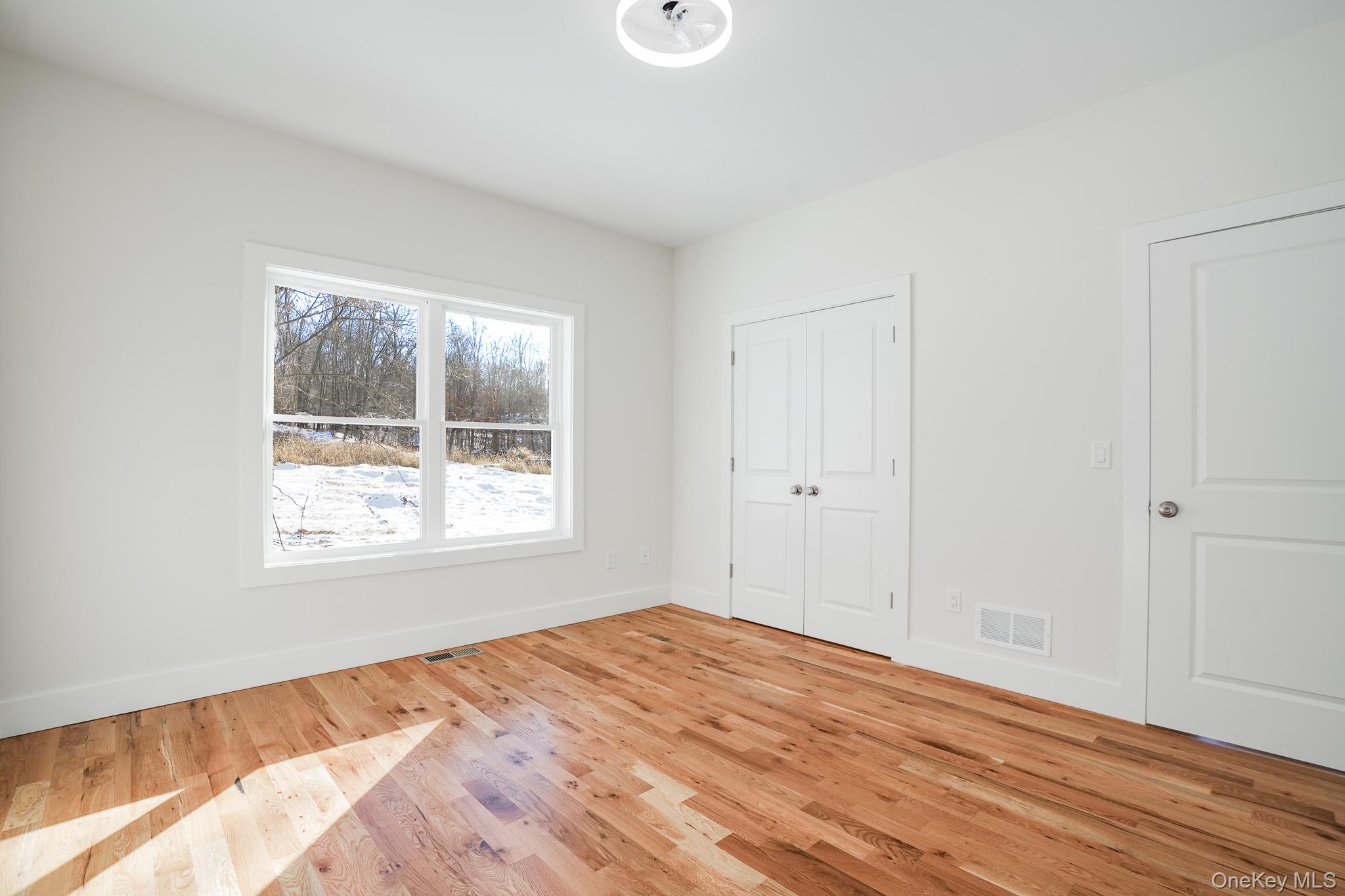 6 Roundhill Road Hopewell Junction, NY 12533 - Photo 16 of 23 a view of an empty room and window