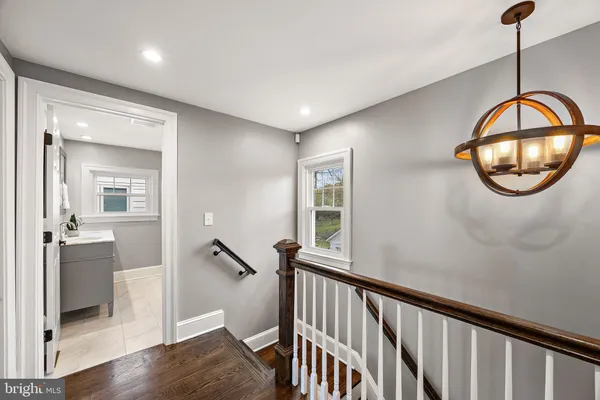 a view of a livingroom with furniture and entryway