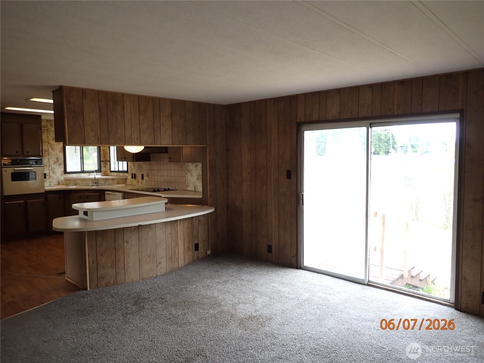 9217 183rd Avenue Southwest Rochester, WA 98579 - Photo 16 of 26 a kitchen with a sink and a window