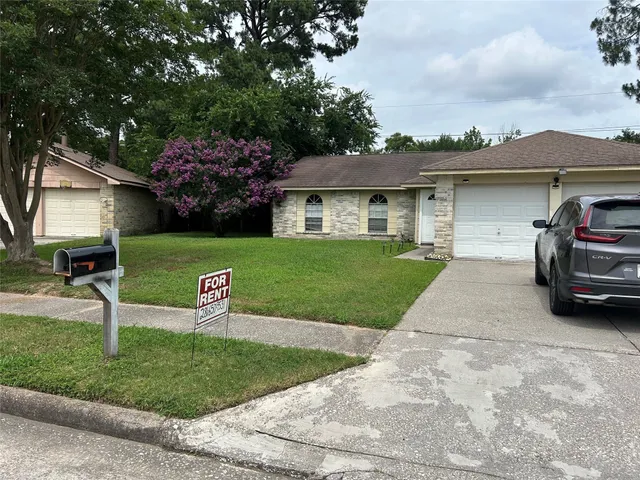 a view of a house with a garden