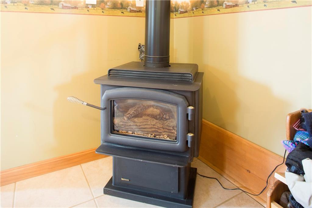 155 Ballard Road St. Albans, ME 04971 - Photo 7 of 29 Regency propane stove in great room