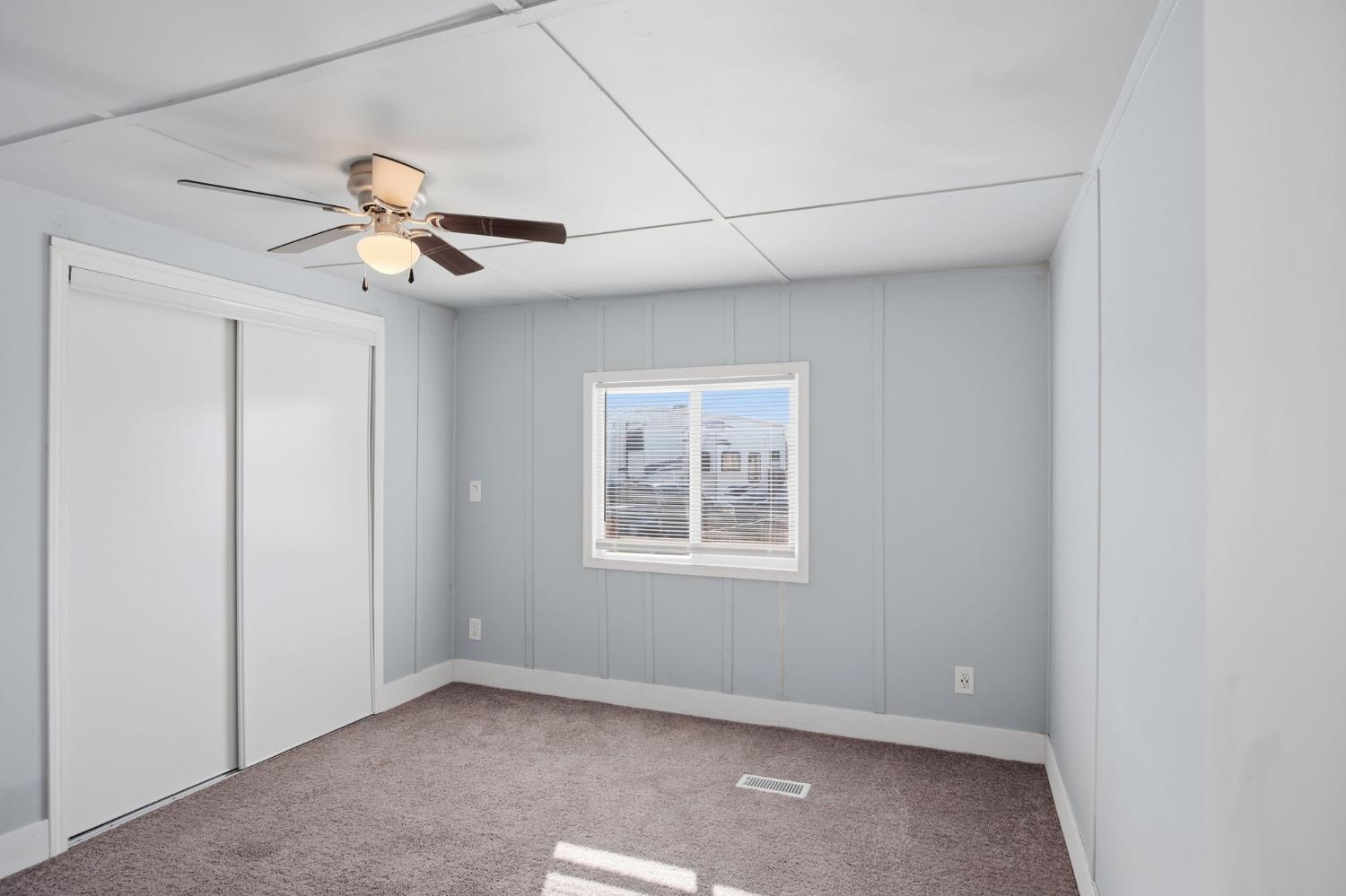 5508 Keith Court, Unit 19 Turlock, CA 95382 - Photo 11 of 13 a view of an empty room with a window