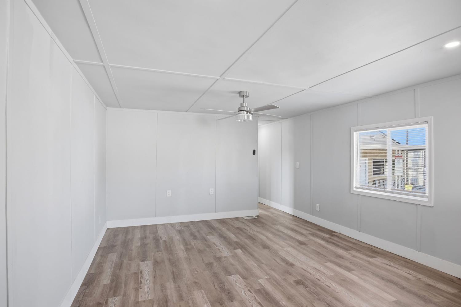 5508 Keith Court, Unit 19 Turlock, CA 95382 - Photo 5 of 13 wooden floor in an empty room