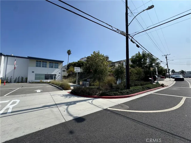 a view of a street with cars
