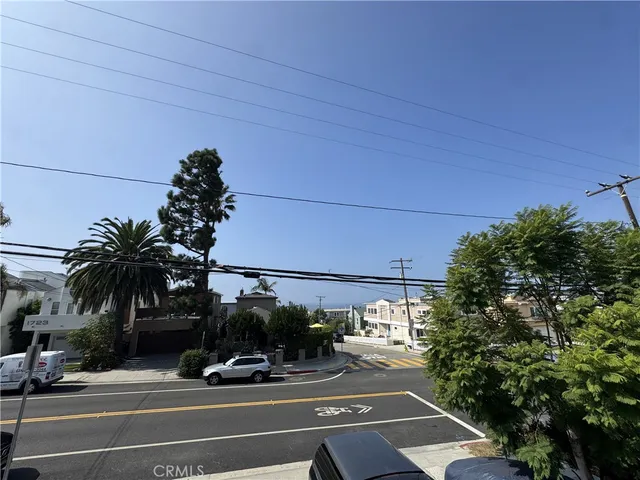 a view of a street with houses