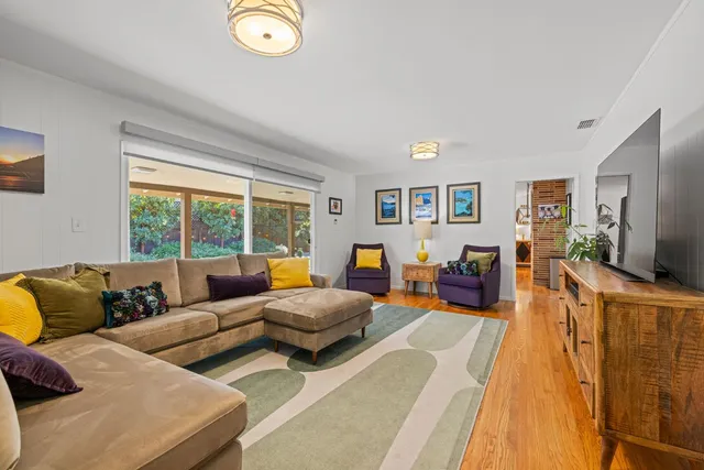 a bathroom with a sink vanity and a mirror