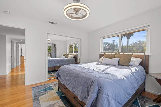 a bathroom with a sink a mirror and vanity