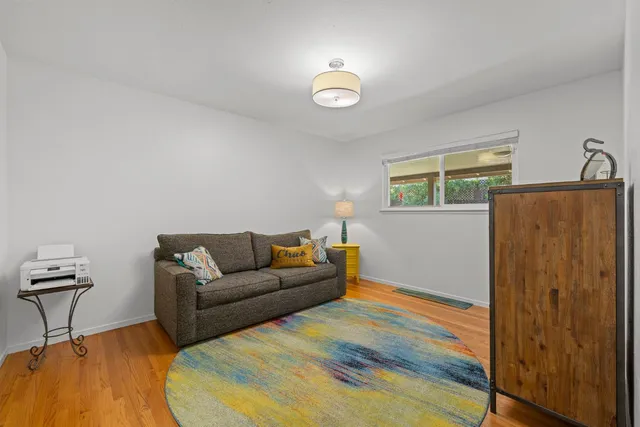 a view of a chairs and table in the patio