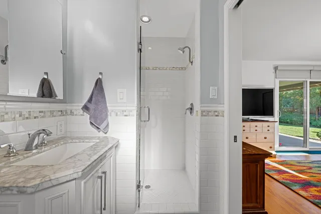 a view of a lobby with plants and trees