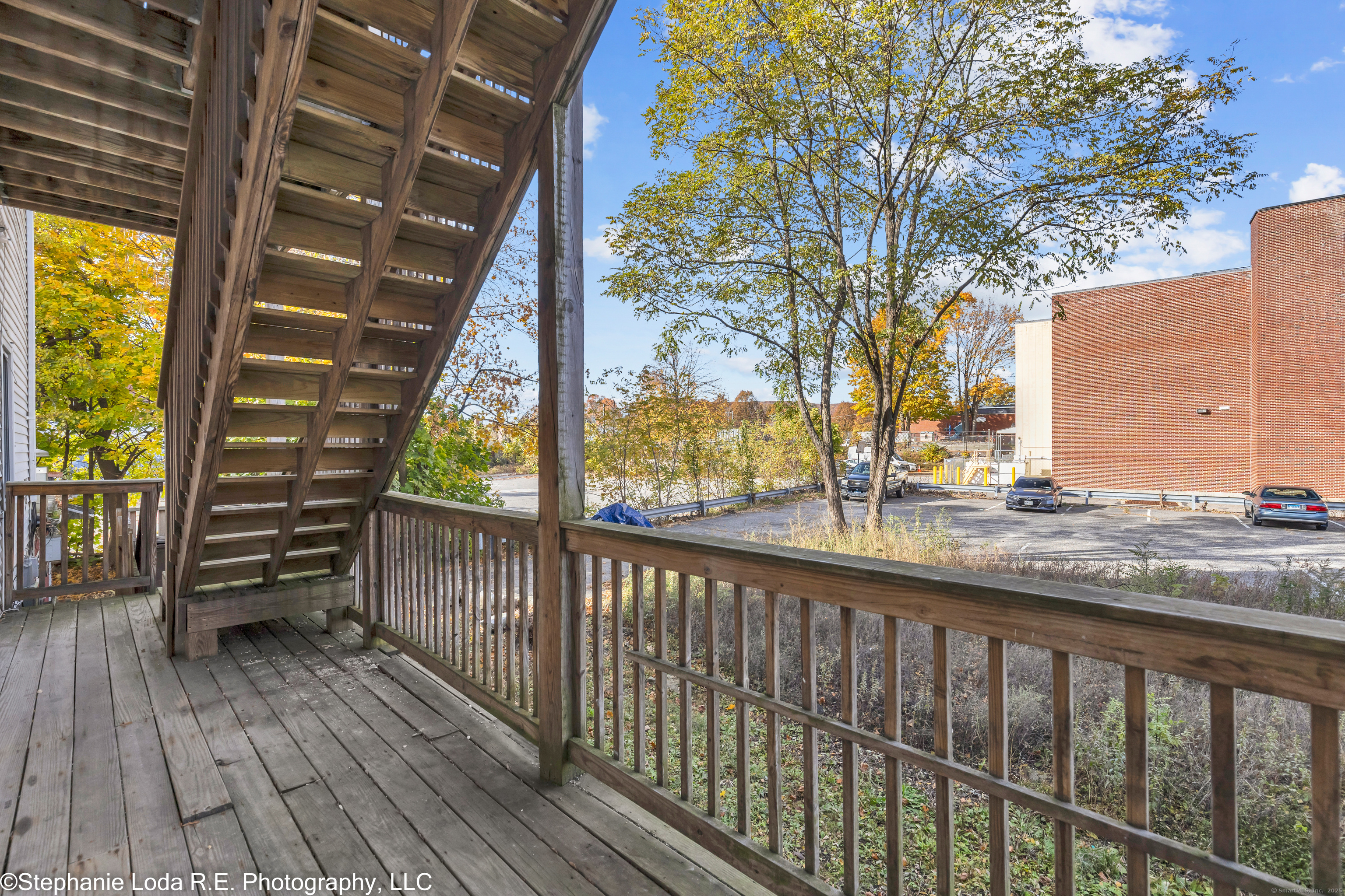 82 Water Street, Unit 2 Torrington, CT 06790 - Photo 19 of 20 a view of balcony with wooden floor