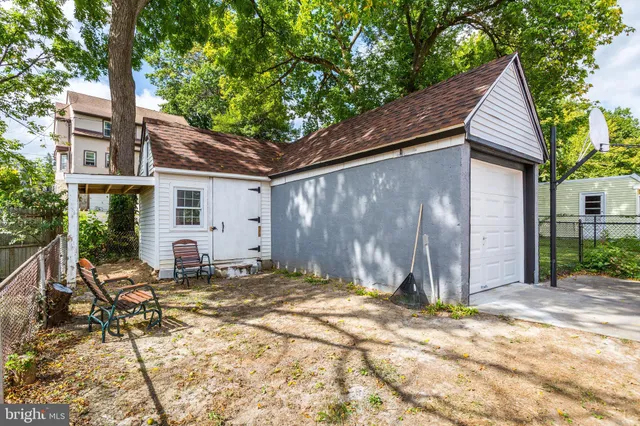 a backyard of a house with seating space