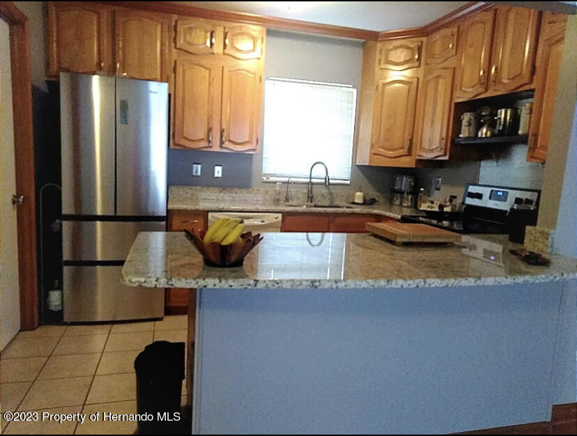 5026 Higate Road Spring Hill, FL 34609 - Photo 3 of 15 B3DC9A05-B895-46F0-8DE8-4B0D859D286B
