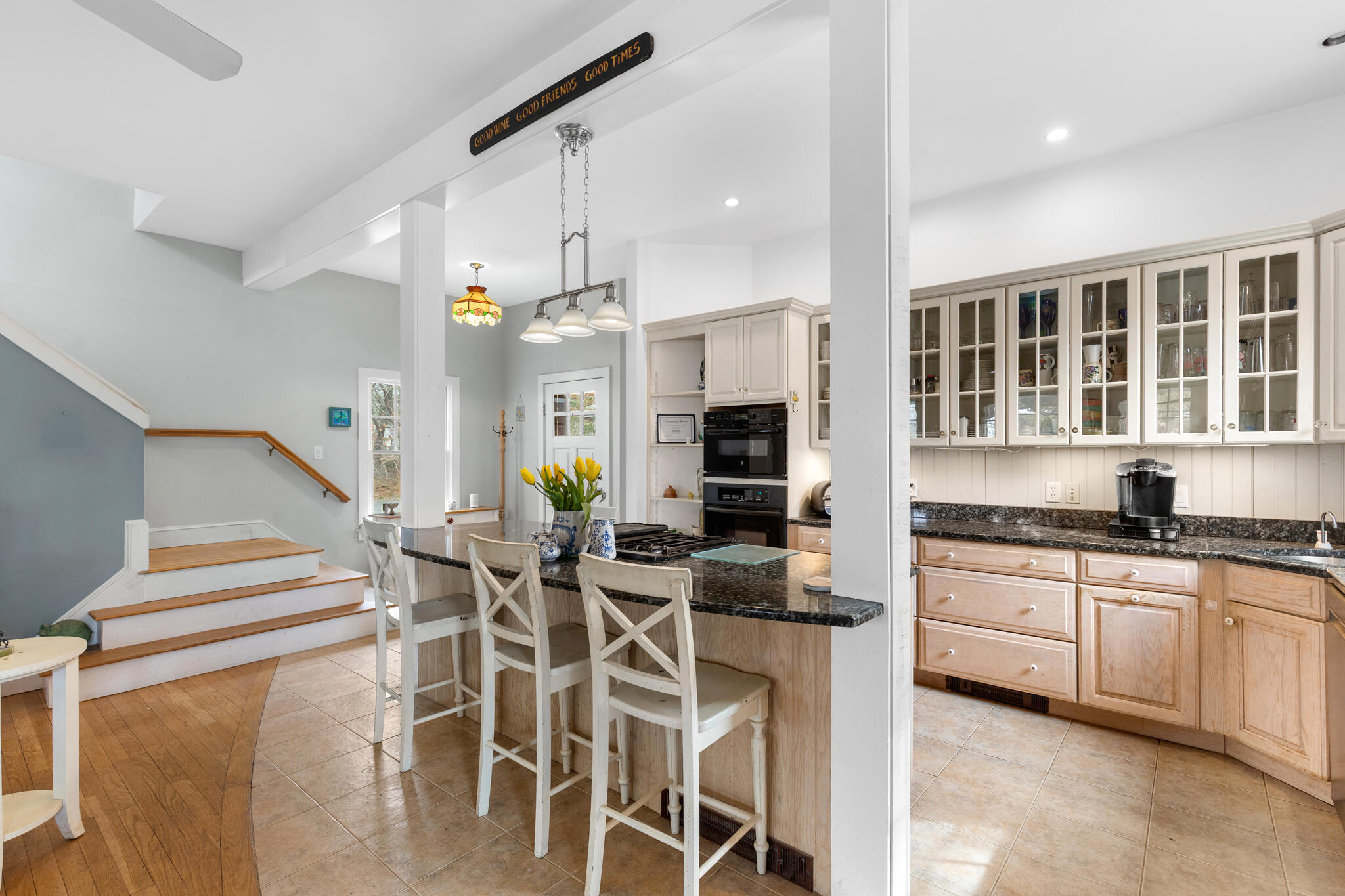311 South Sunken Meadow Road Eastham, MA 02642 - Photo 13 of 57 a kitchen with stainless steel appliances kitchen island granite countertop a stove a sink and a refrigerator