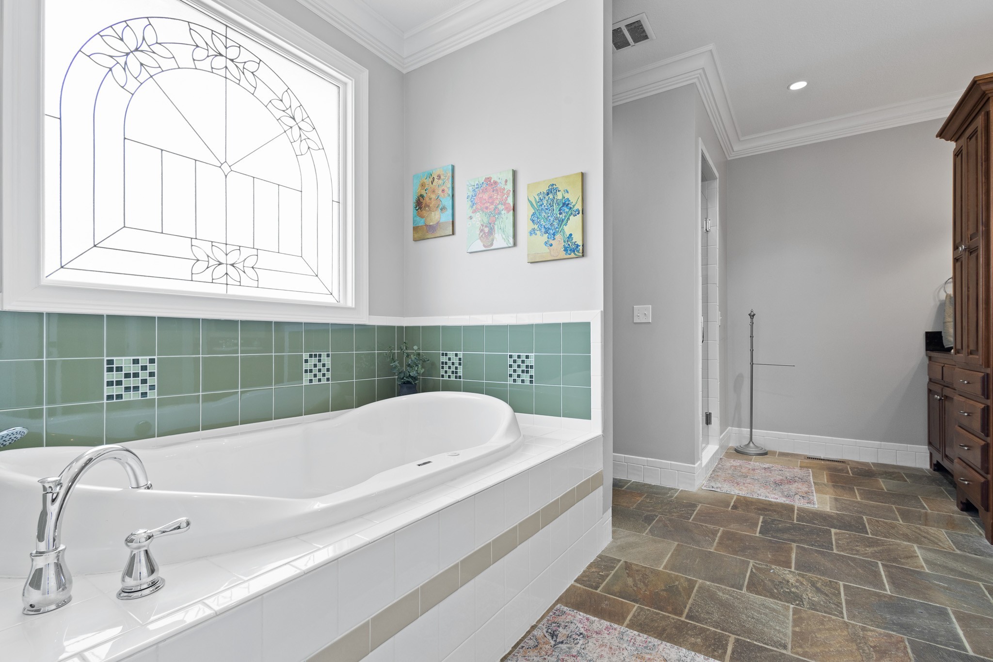 102 Highpoint Boulevard Tullahoma, TN 37388 - Photo 16 of 49 a bathroom with a tub a sink and a shower