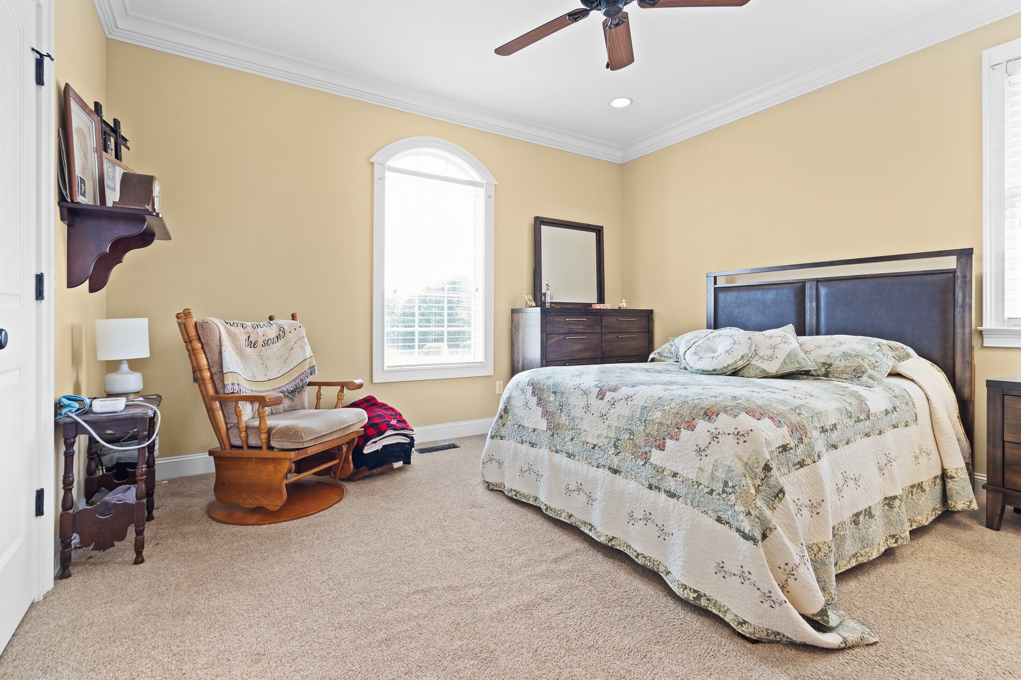 102 Highpoint Boulevard Tullahoma, TN 37388 - Photo 20 of 49 a spacious bedroom with a bed and chair
