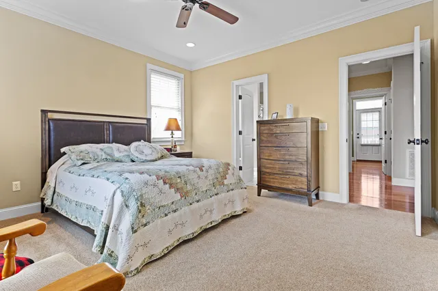 a bedroom with a bed and a cabinets