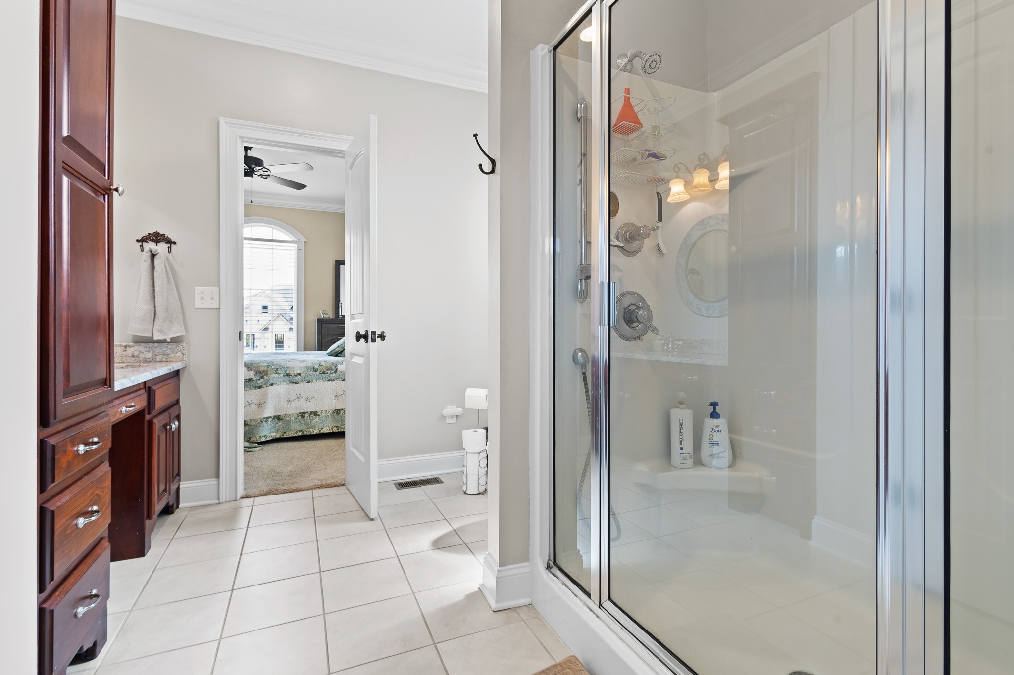 102 Highpoint Boulevard Tullahoma, TN 37388 - Photo 23 of 49 a bathroom with a granite countertop shower mirror and toilet