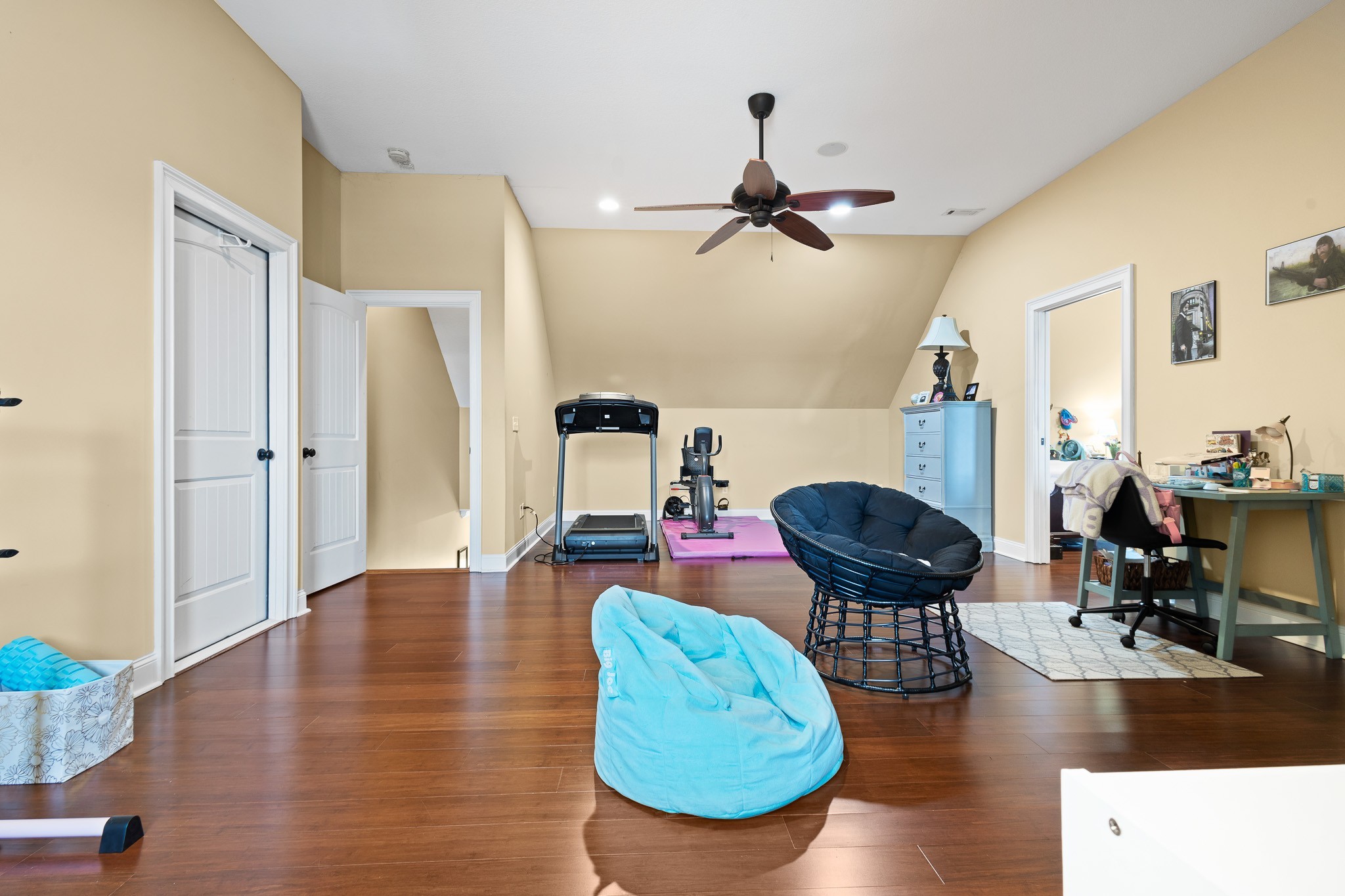 102 Highpoint Boulevard Tullahoma, TN 37388 - Photo 25 of 49 a living room with furniture and a chandelier