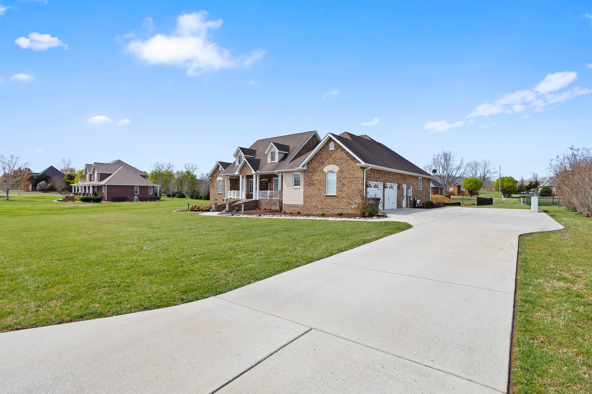 102 Highpoint Boulevard Tullahoma, TN 37388 - Photo 34 of 49 a view of house with garden