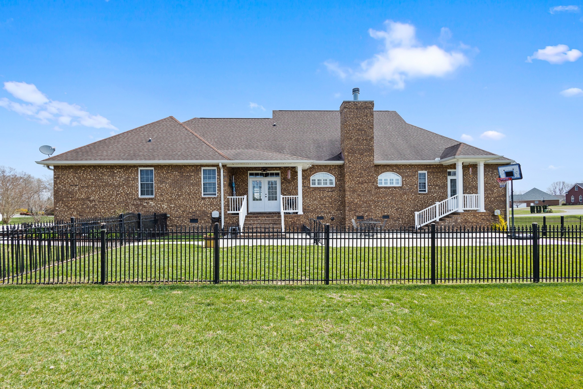 102 Highpoint Boulevard Tullahoma, TN 37388 - Photo 37 of 49 a view of a house with a big yard and a garden