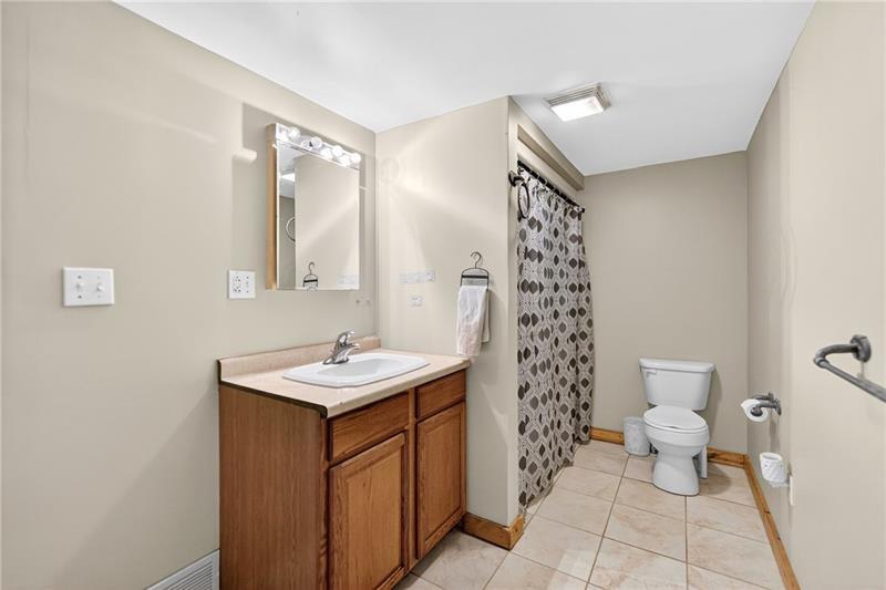 6 Browntown Road Avella, PA 15312 - Photo 16 of 49 a bathroom with a sink a toilet and a mirror