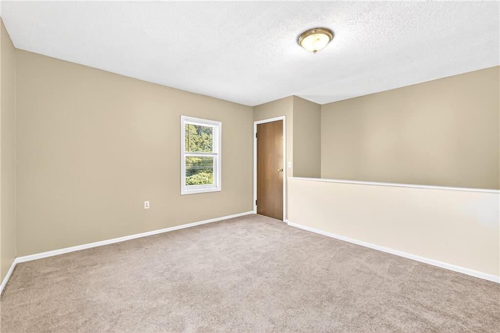 6 Browntown Road Avella, PA 15312 - Photo 23 of 49 a view of an empty room with a window