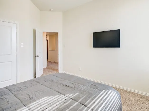 an aerial view of a house with swimming pool garden and furniture