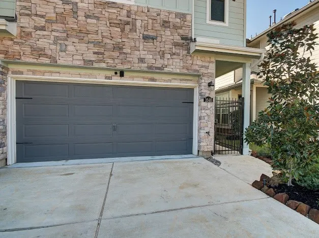 a kitchen with stainless steel appliances granite countertop a refrigerator and a stove