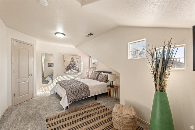 345 North 2450th Street East, Unit 152 St. George, UT 84790 - Photo 23 of 40 Carpeted bedroom with baseboards