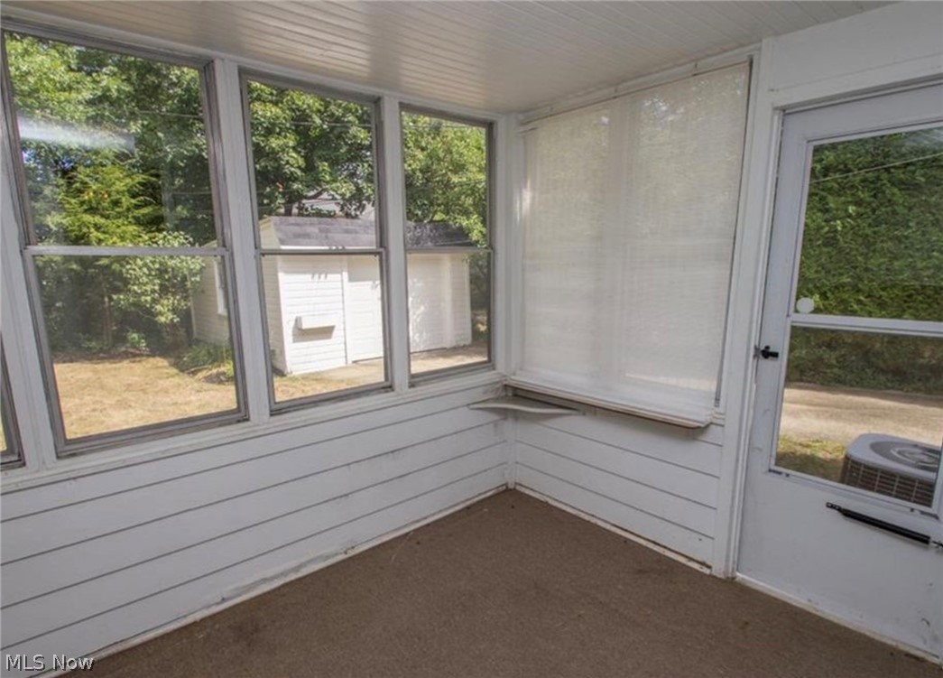 3563 Woodridge Road Cleveland Heights, OH 44121 - Photo 7 of 20 The Sun Room with three sides of windows