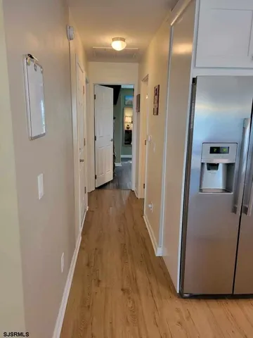 a bathroom with a toilet sink and shower