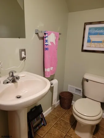 a bathroom with a sink and a toilet