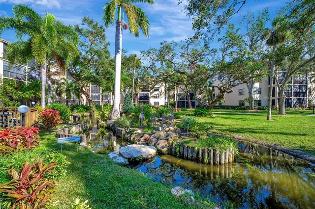 a view of a swimming pool with a garden