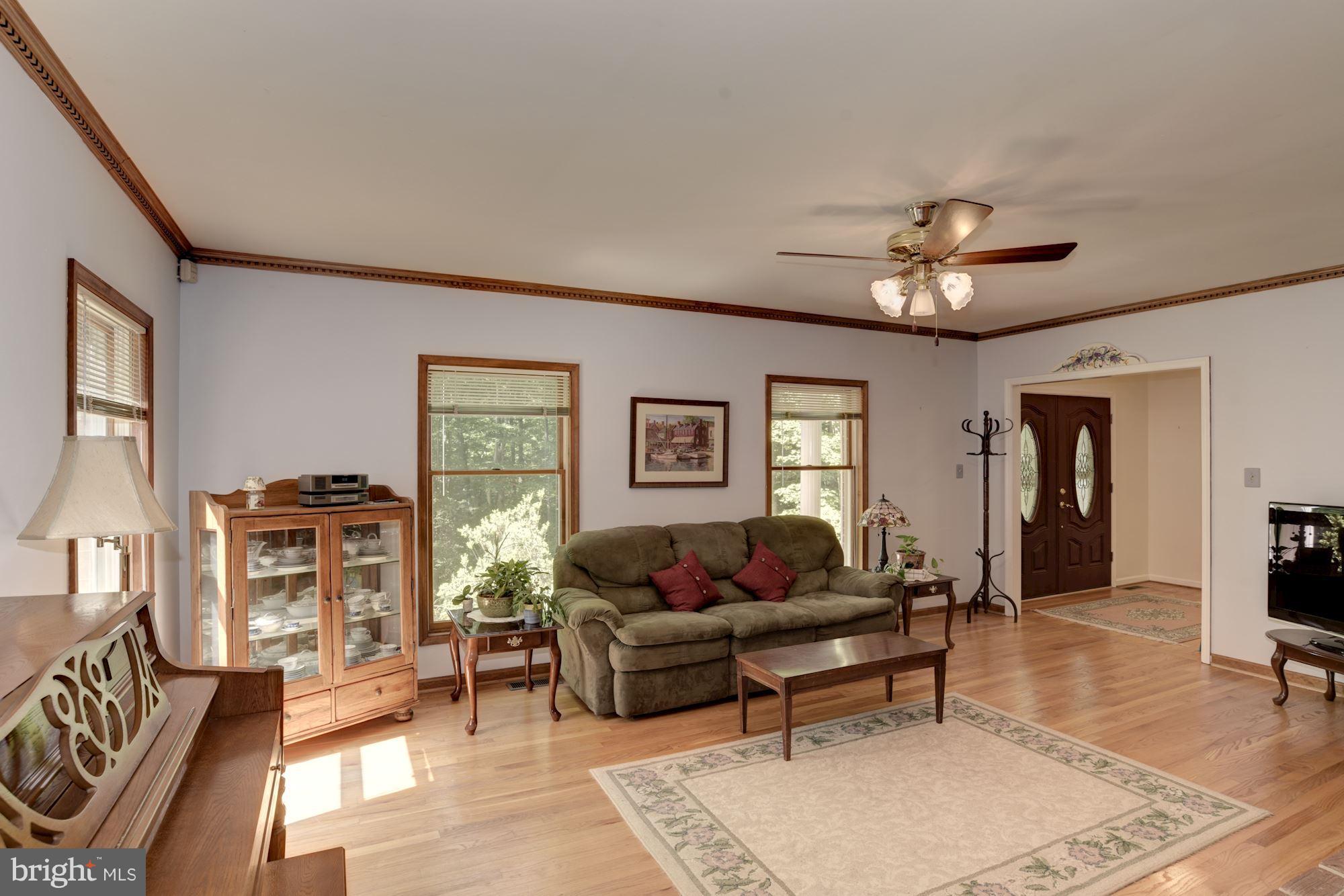 7100 Stone Road Manassas, VA 20111 - Photo 12 of 29 Light bright living room with many windows