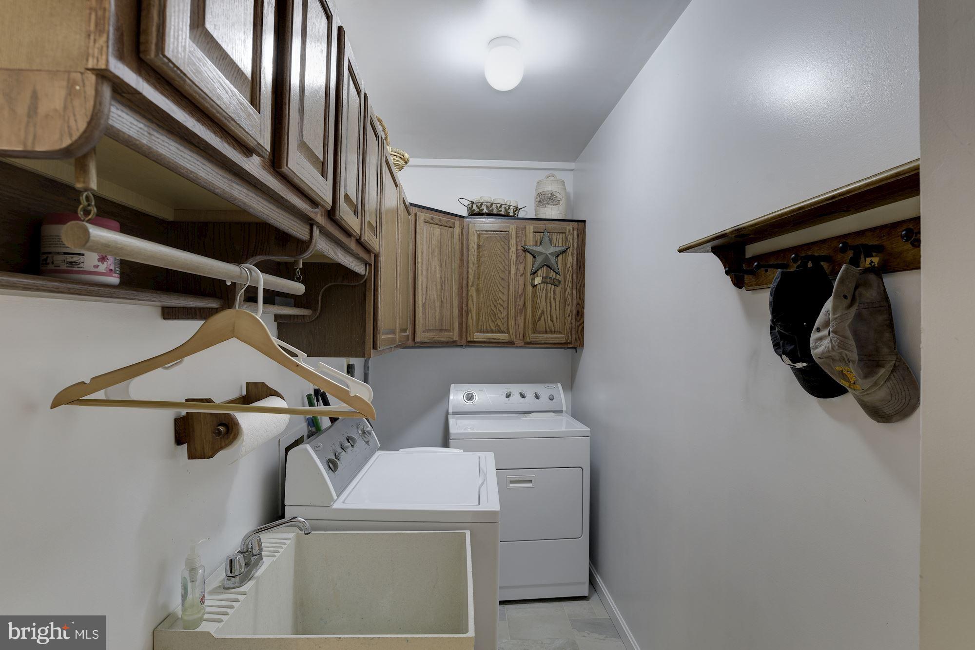 7100 Stone Road Manassas, VA 20111 - Photo 22 of 29 Main level laundry with laundry tub