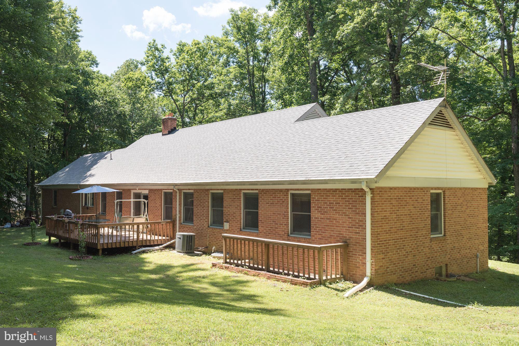 7100 Stone Road Manassas, VA 20111 - Photo 25 of 29 Rear of brick rambler