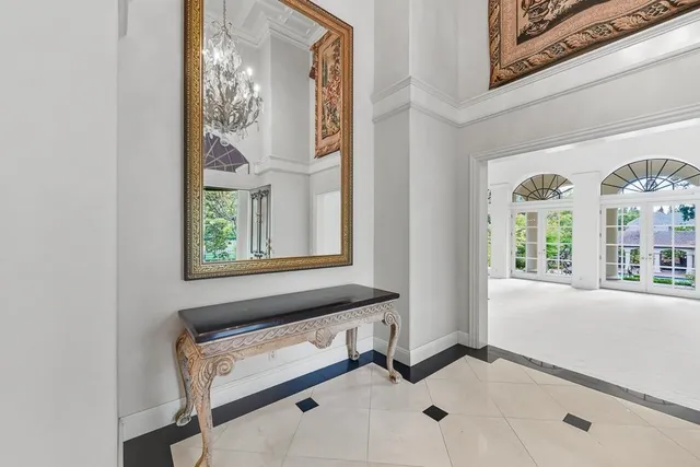 a view of an entryway with front door