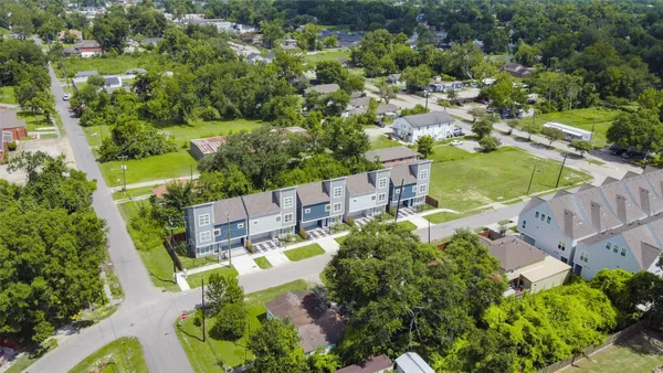 an aerial view of a house with a garden