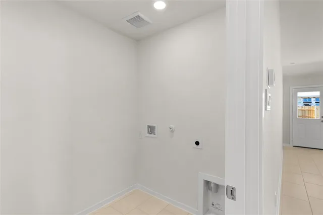 a bathroom with a double vanity sink toilet and a mirror