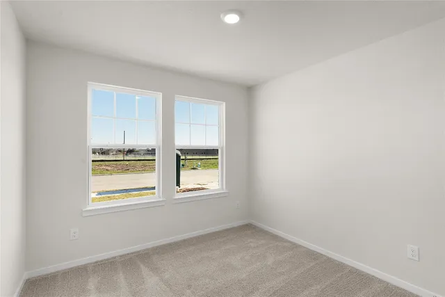 a view of kitchen and windows